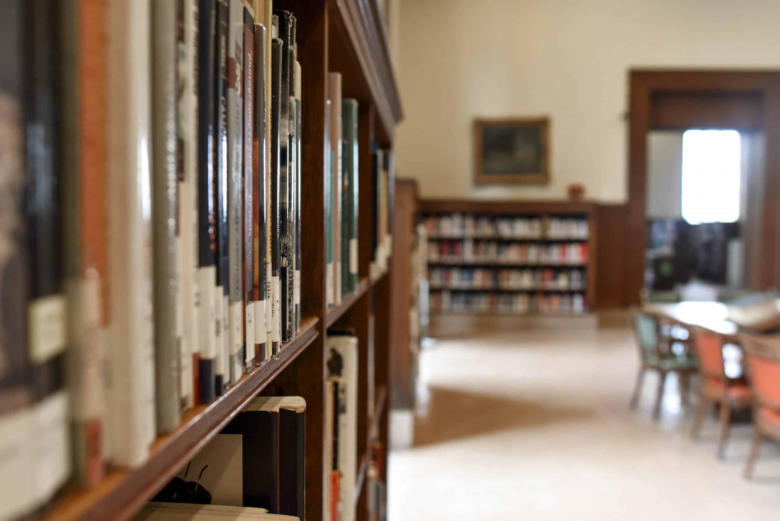 selective-focus-photography-of-bookshelf-with-books-1370296